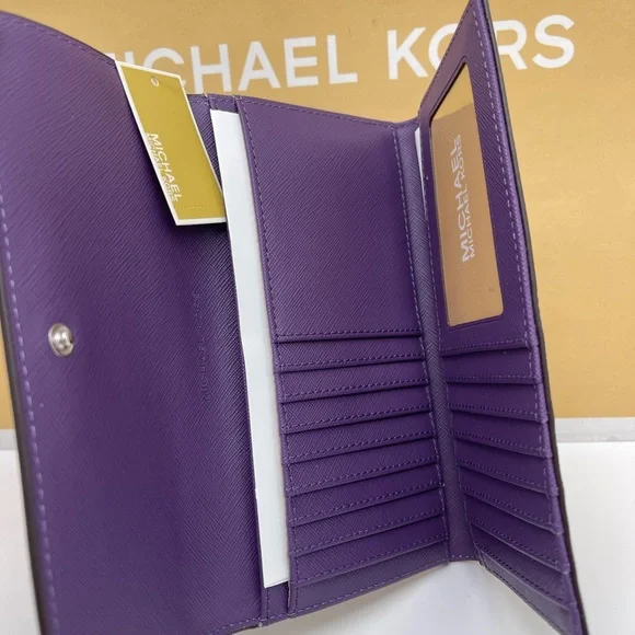 Michael Kors Lg Jet Set Travel Trifold Leather Wallet 
Dark Purple 
NWT - Picture 5 of 16